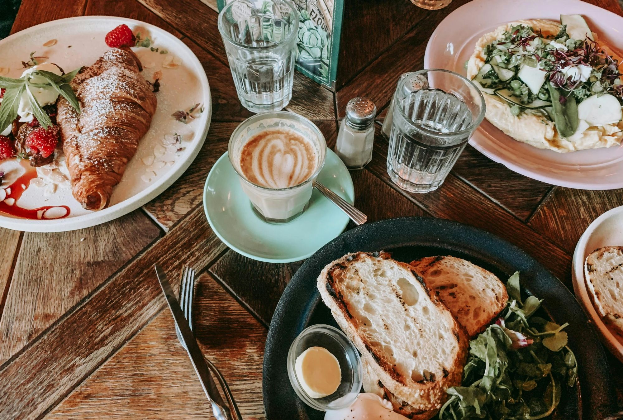 A variety of brunch food options at a cafe