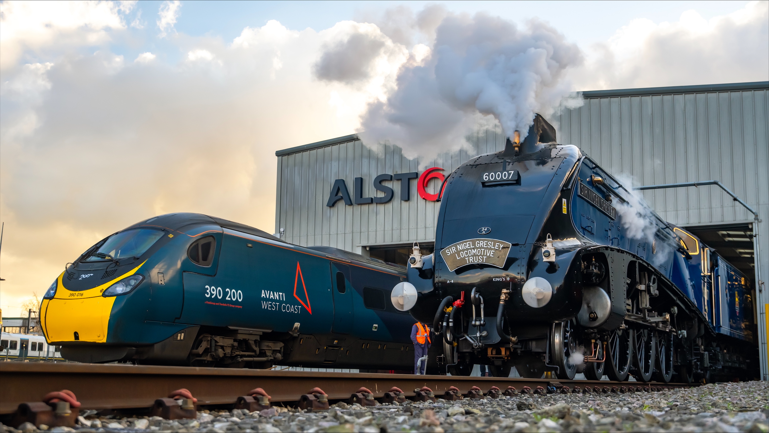 two trains parked in a shed