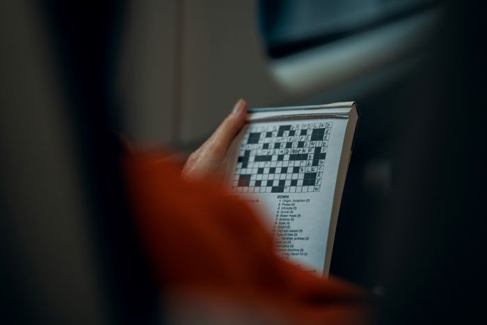 Person doing a crossword