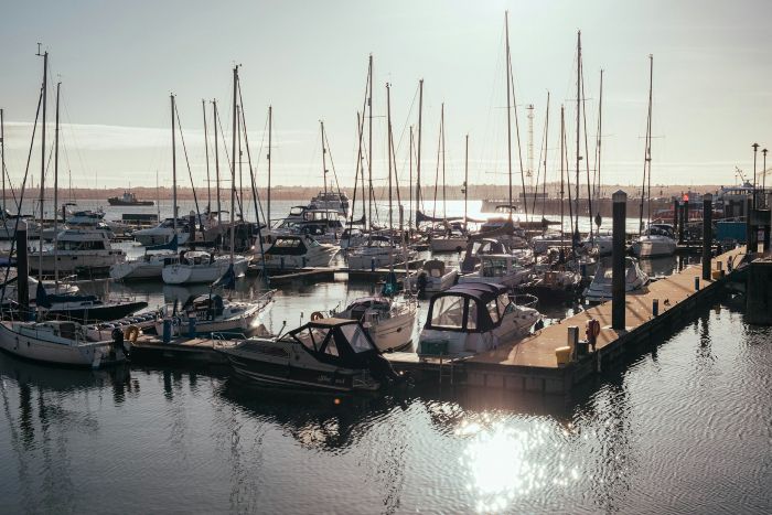 Sail boats moored in Southampton harbour.