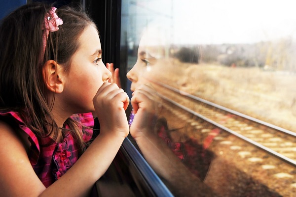 A girl looking out the window.